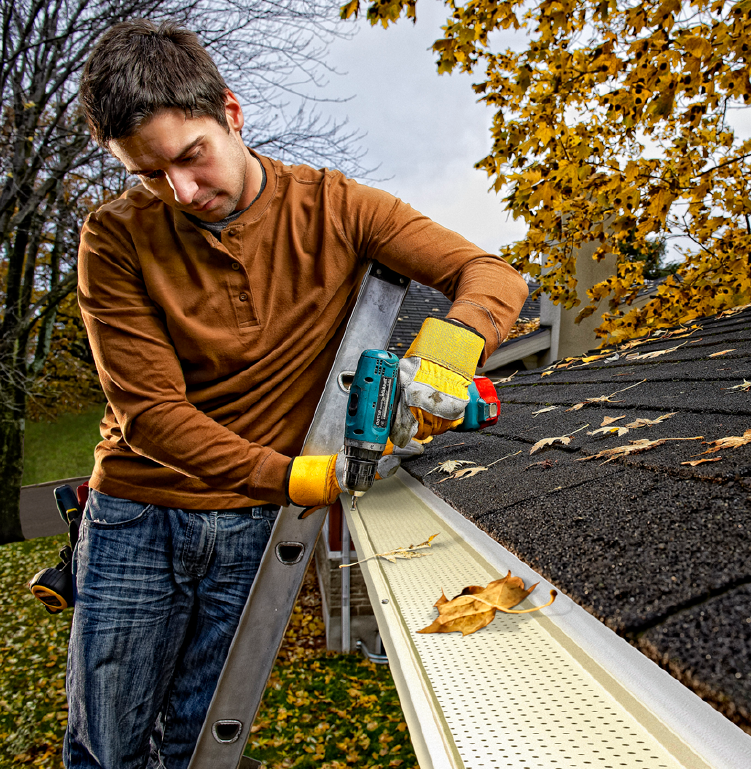 Eavestrough Protection - 375 Roof Inc. contractor installing gutter guard protection